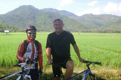 cycling through rice paddies - interesting activities in lombok tour